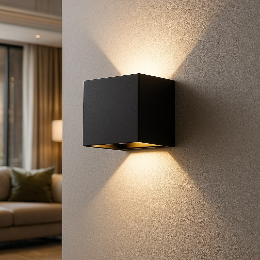 Black motion sensor LED wall light, perfect for modern indoor or outdoor accent lighting & security.