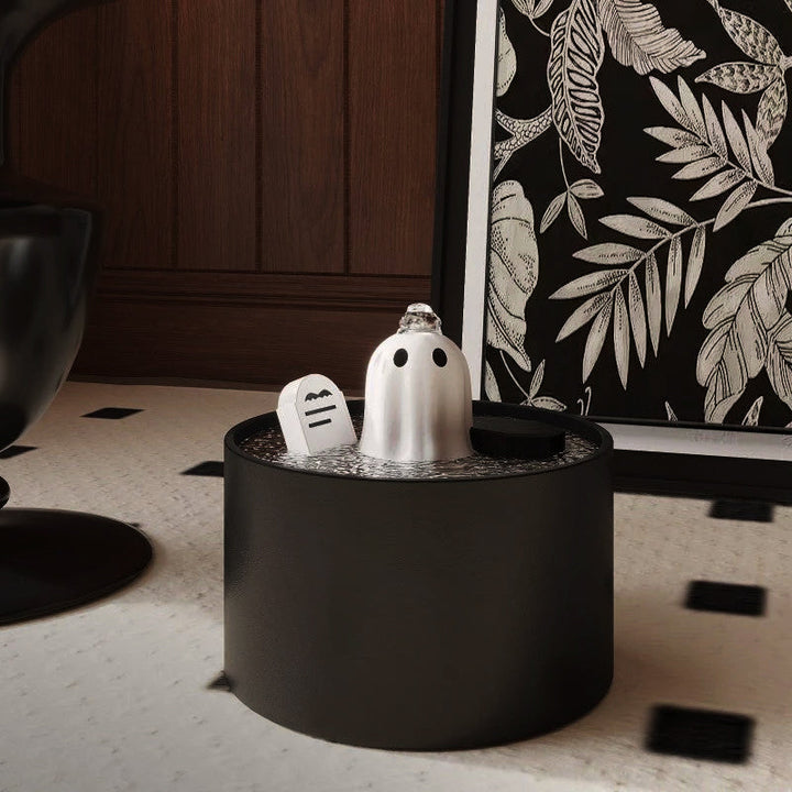 Gothic black ceramic cat water fountain with ornate relief, promoting pet hydration and quiet operation.
