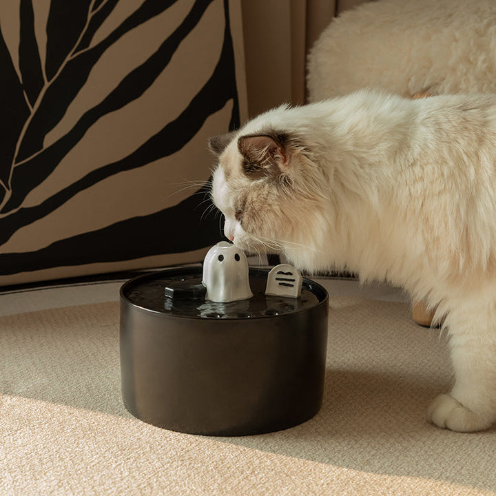 Automatic multi-tier ceramic cat water fountain in gothic style ensuring fresh, filtered water for cats.
