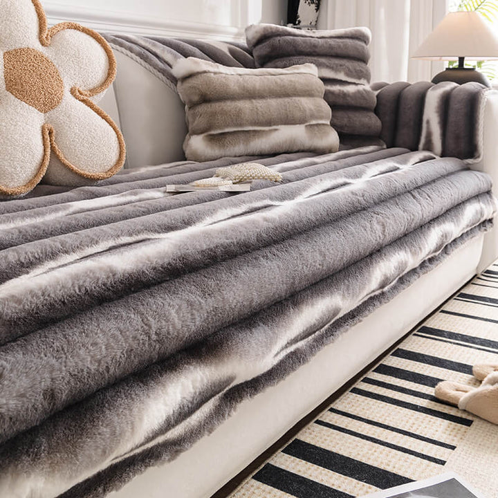 Gradient Stripe Plush Sofa Cover in soft blue tones, protecting a sectional sofa