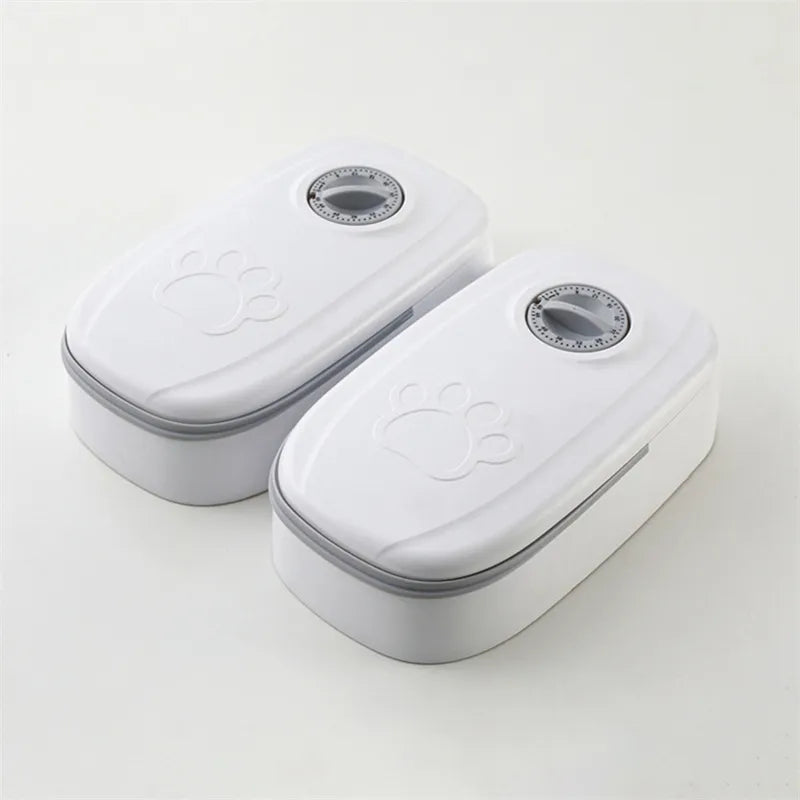 Smart pet feeder with timer, gray, providing reliable food dispensing for cats and dogs.