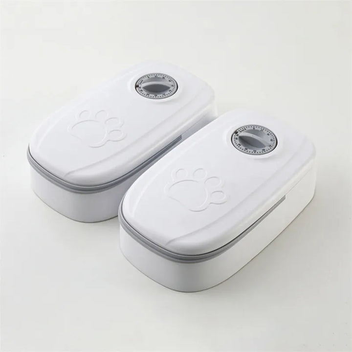 Smart pet feeder with timer, gray, providing reliable food dispensing for cats and dogs.