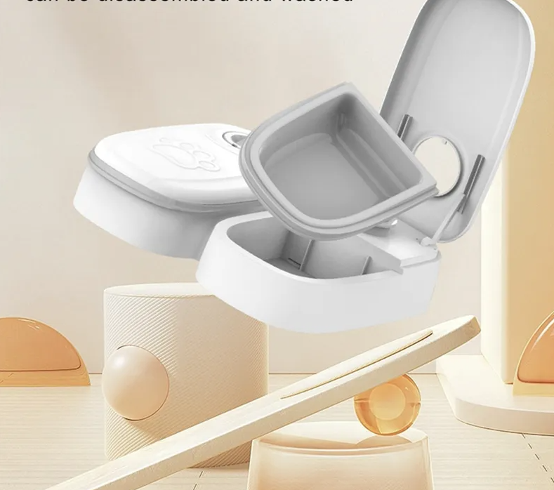 Durable automatic pet feeder for dogs & cats, gray, for convenient scheduled meals.