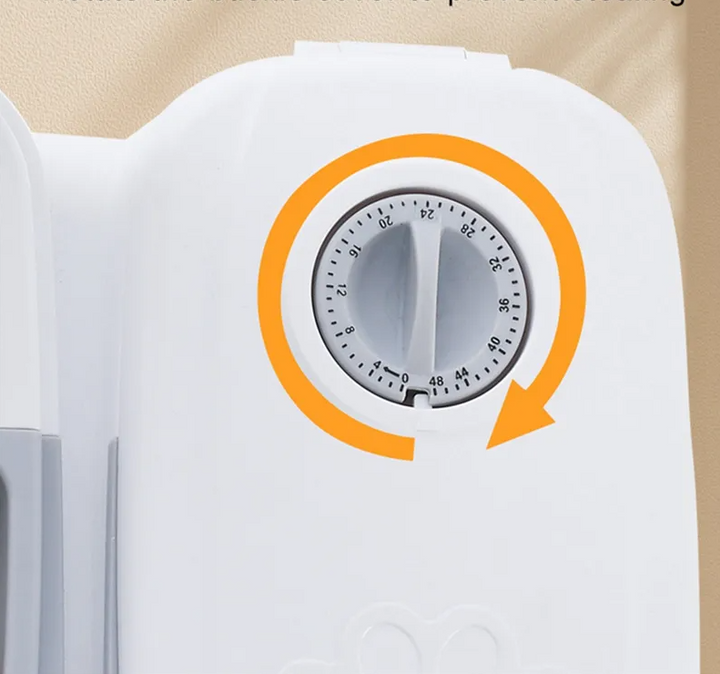 Automatic gray food dispenser for pets, ensuring fresh meals for cats and dogs.