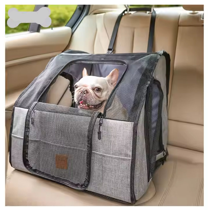 Durable gray pet car carrier, ideal for safe and comfortable dog travel.