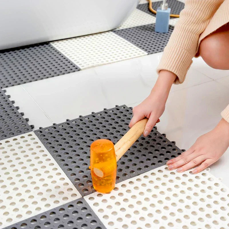 Anti-slip wet area mat. Quick-dry, mold-resistant interlocking shower tiles ensure bathroom safety & hygiene.