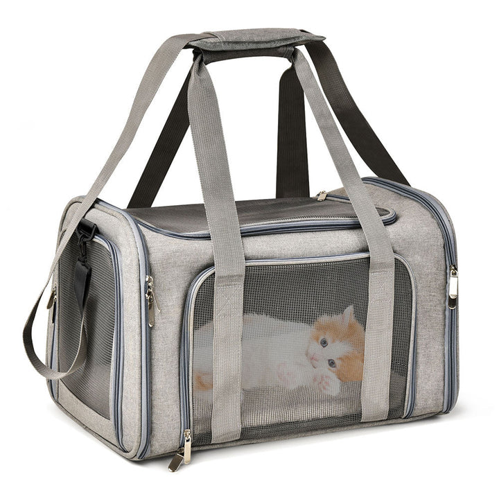 Gray soft-sided airline-approved pet carrier for small dogs with breathable mesh.
