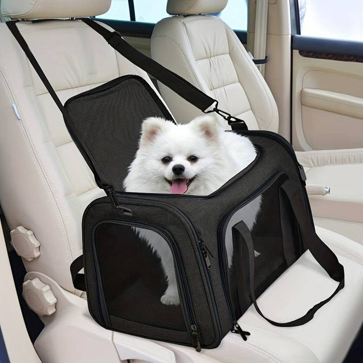 Airline approved travel bag for small dogs, soft-sided with ventilation, in gray color.