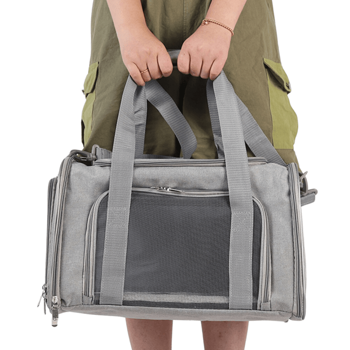 Hands-free airline pet carrier for small dogs, gray, comfortable and breathable.