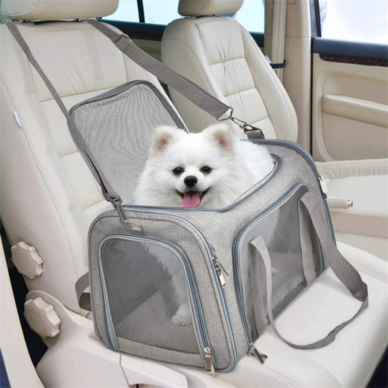 Gray soft-sided dog or cat carrier backpack, ideal for travel and outdoor adventures