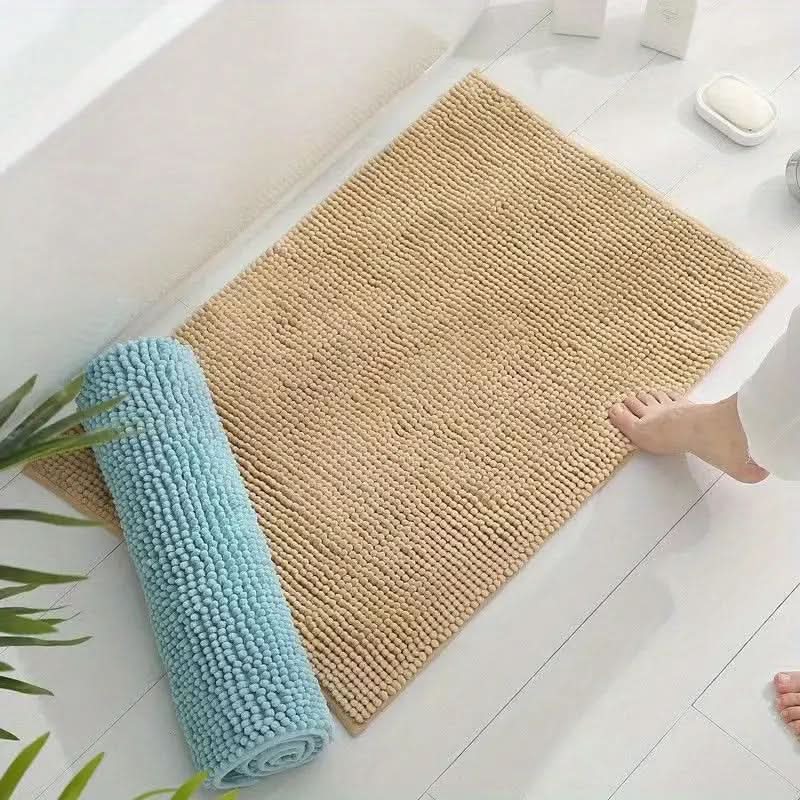 Unisex ultra soft gray chenille bath mat. Absorbent, non-slip bathroom rug, perfect for home decor.