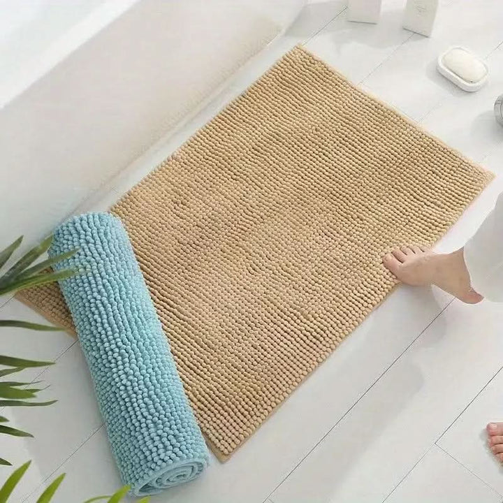Unisex ultra soft gray chenille bath mat. Absorbent, non-slip bathroom rug, perfect for home decor.