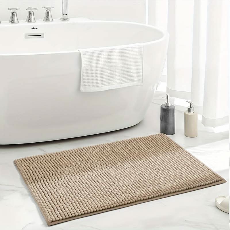 Plush blue chenille bath mat, ultra soft, with non-slip backing. Absorbent and washable bathroom rug.