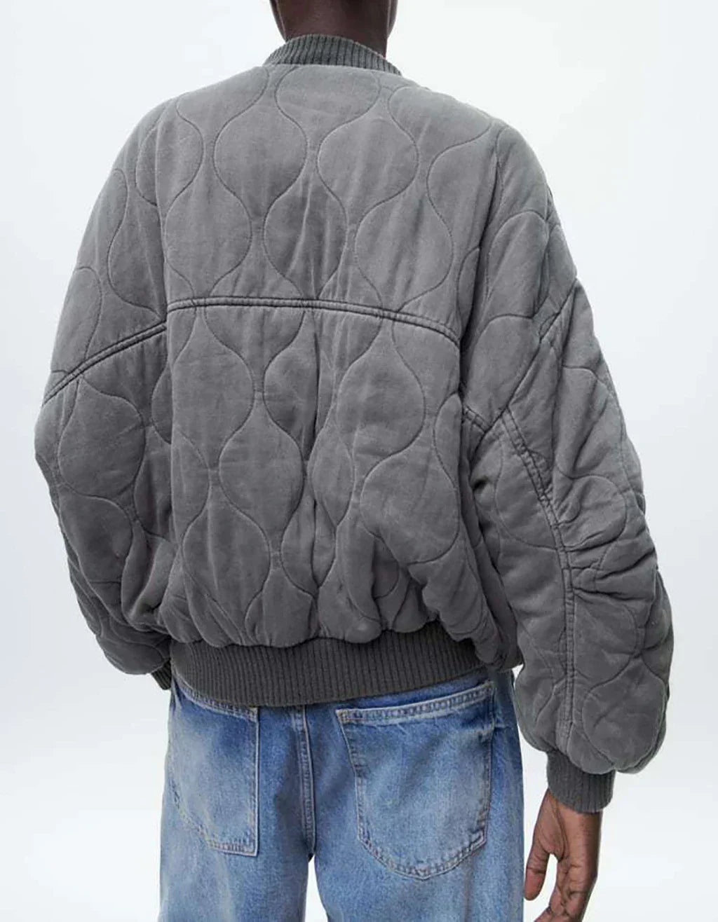 Versatile gray quilted bomber jacket for women. Ideal casual outerwear for autumn fashion & everyday style.