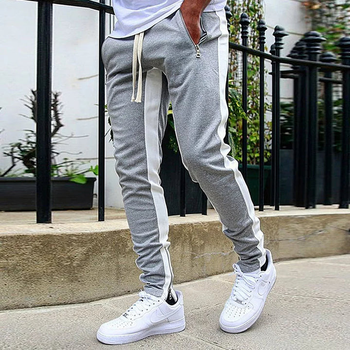 Stylish men's FlexStride activewear joggers. Versatile casual pants with a modern design for comfort.