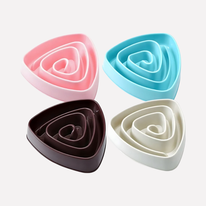 Close-up of a blue interactive dog dish with an anti-gulping design, ideal for pet food and treats
