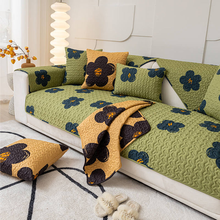Green cotton non-slip sofa cover for living room, protecting furniture from pets