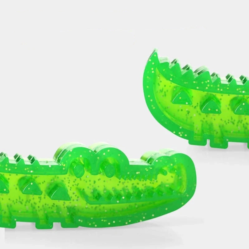 Crocodile-shaped dog slow feeder chew toy, aids digesion and cleans teeth.