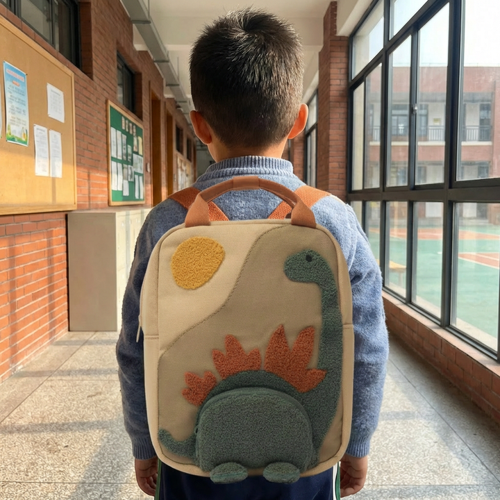 Toddler dinosaur backpack for preschool adventures, durable & lightweight, ideal for boys & girls daily use & travel.