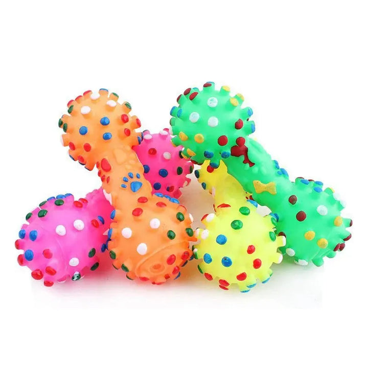 Green dog dental chew ball with textured surface for teeth cleaning and fresh breath, durable pet toy.