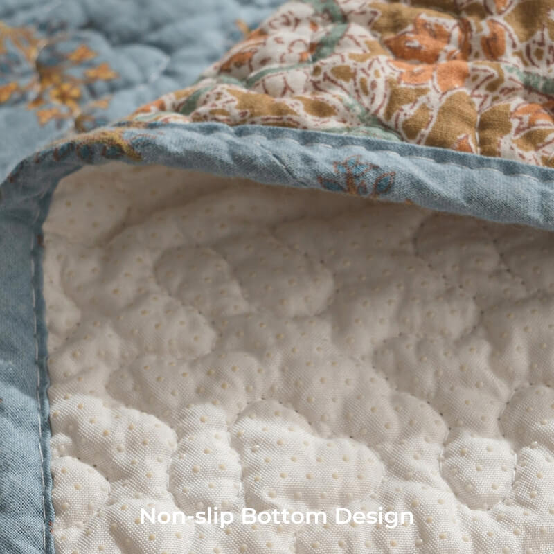 Stylish green floral cotton couch cover, ideal for home decor and pet friendly protection.