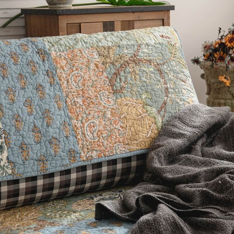 Non-slip green cotton couch cover with intricate floral design, perfect pet friendly addition.