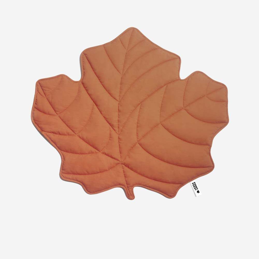 Green leaf pet blanket, a comfortable dog mat and appealing piece of home decor.