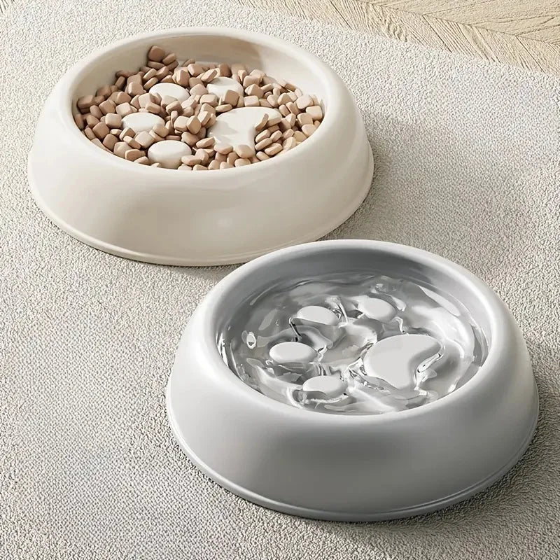 Close-up of blue paw print slow feeder pet bowl maze, encouraging healthy digestion