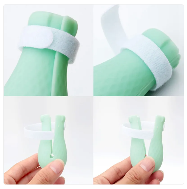 Cat care product: durable green silicone paw caps for effective scratch prevention during grooming.
