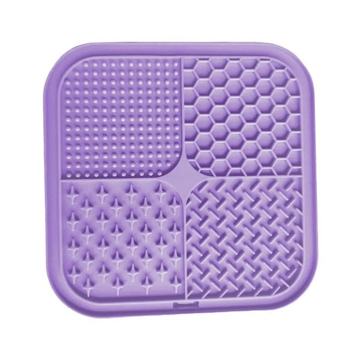 Green silicone lick mat for dogs and cats, promoting slow feeding and enrichment.