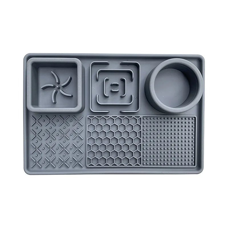 Set of pet accessories: a slow feeder dog bowl and a patterned licking mat, promoting healthy eating