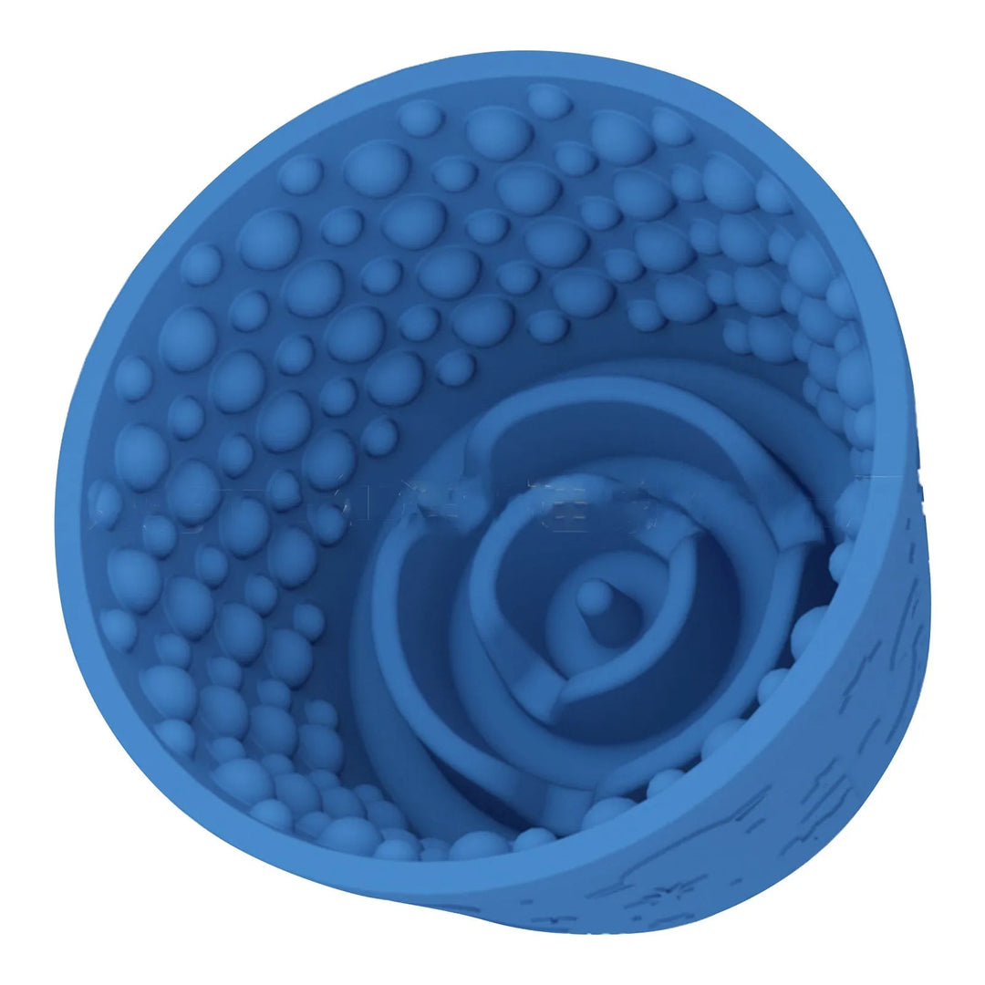 Close-up of a blue silicone slow feeder licking bowl, ideal for healthy eating and anxiety relief in pets.