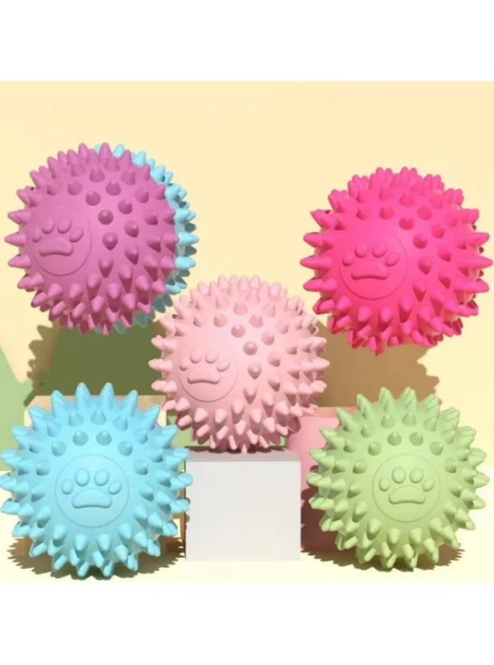Durable rubber puppy toy chew ball, perfect for dental hygiene and engaging play.