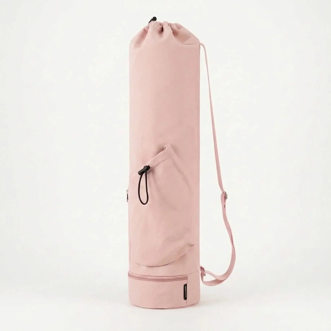 Pink women's cylindrical pilates mat carrier bag, essential workout gear for a hassle-free experience.