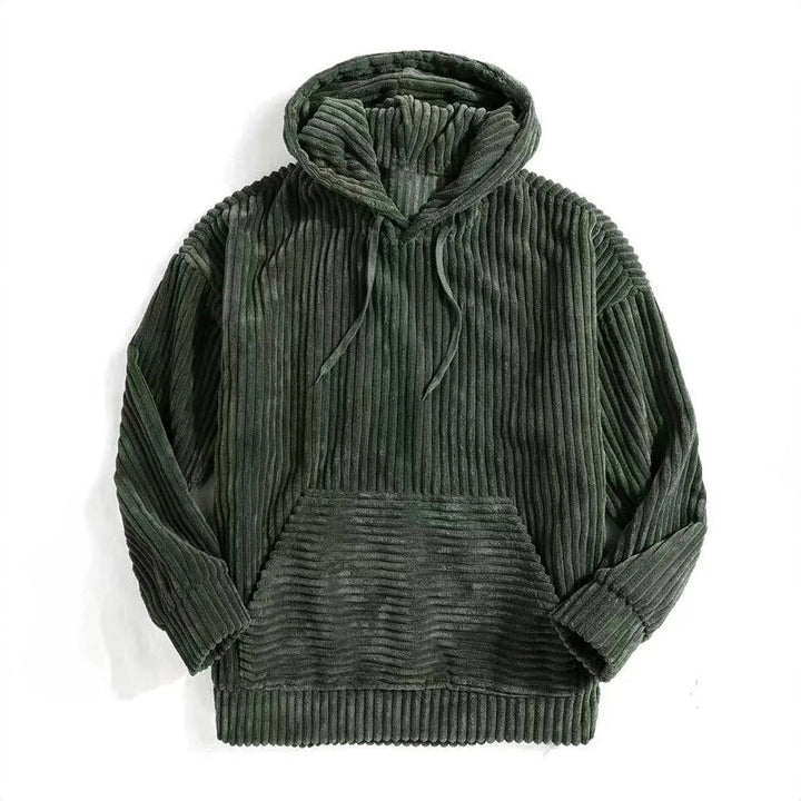 Man wearing a relaxed fit corduroy hoodie. Stylish pullover for men, perfect for comfortable fall & winter casual wear.