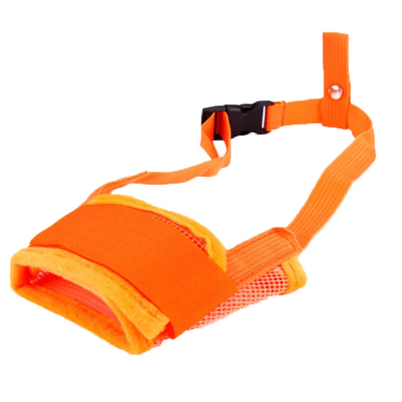 Side view of a happy dog in a black mesh muzzle, promoting safety and stress-free care