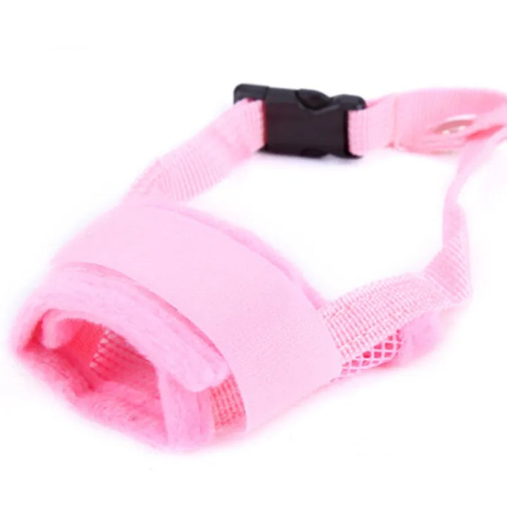 Dog training muzzle made of soft, breathable mesh with adjustable straps for various breeds