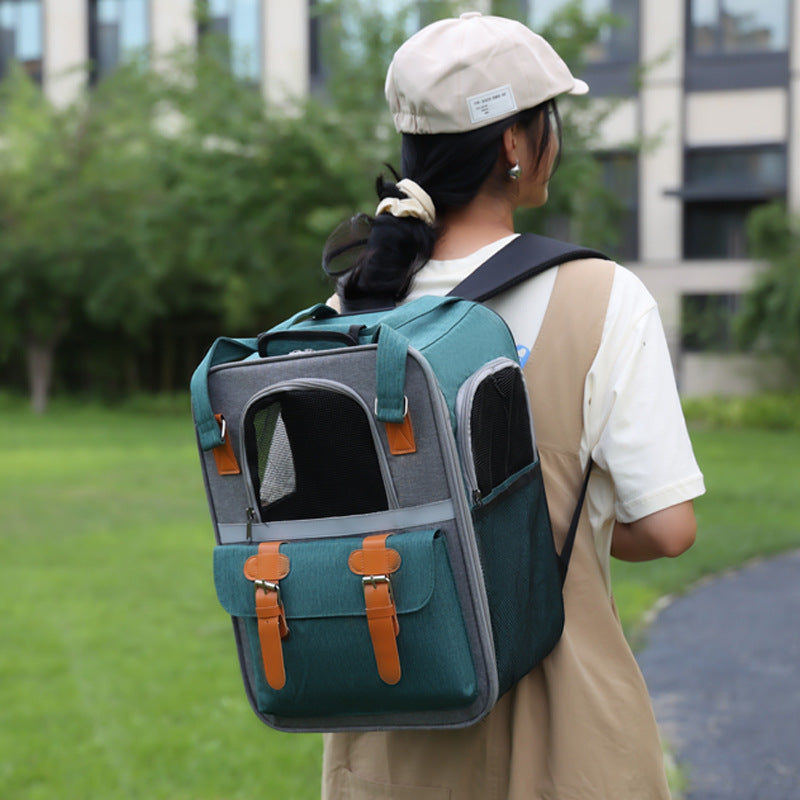 Grey cat pet carrier bag for car travel, side view, with mesh windows, stylish pet accessory