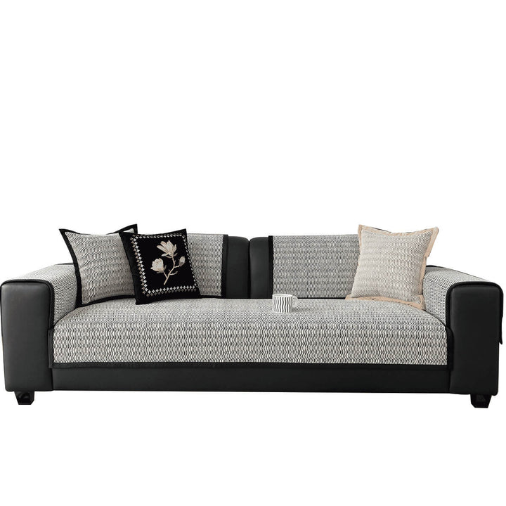 Textured chenille non-slip sofa cover swatch, highlighting its soft feel and durable pet protection.