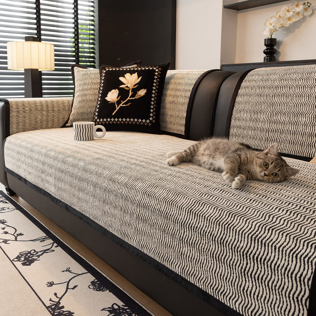 Detail of a textured chenille non-slip sofa cover, designed for pet protection and home furniture.