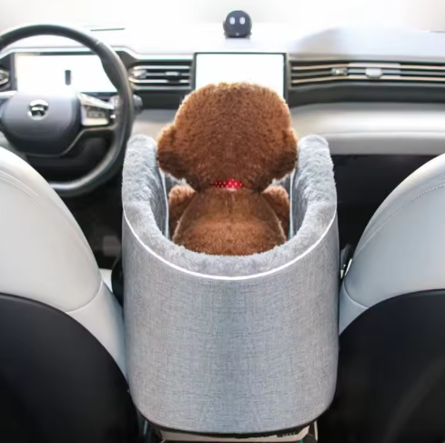 Empty grey pet safety car seat, ready for a dog's secure and comfortable car journey