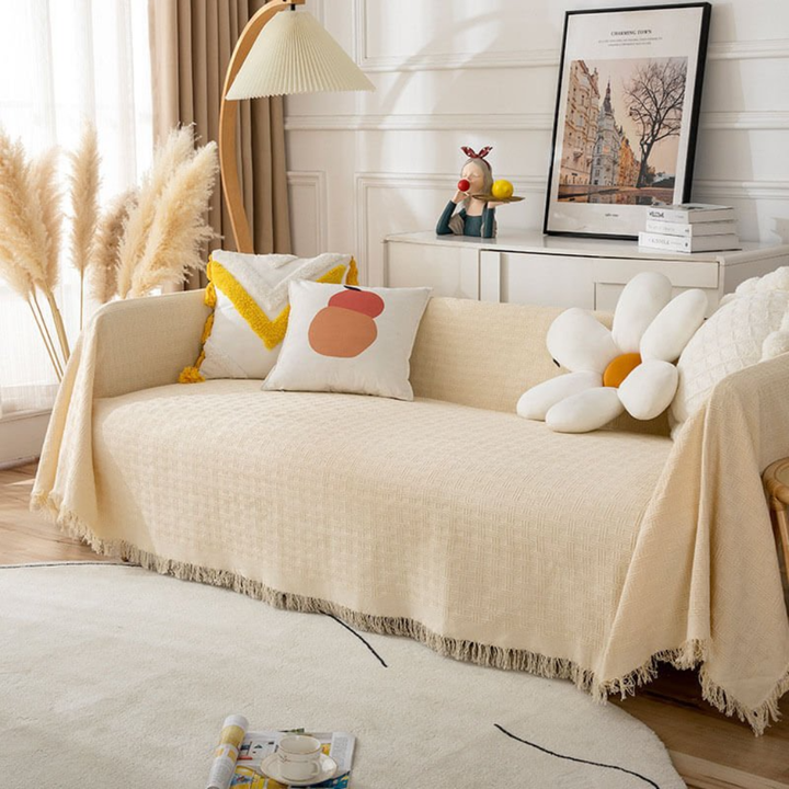 Close-up of textured linen look stretch sofa cover, durable and pet friendly for living room