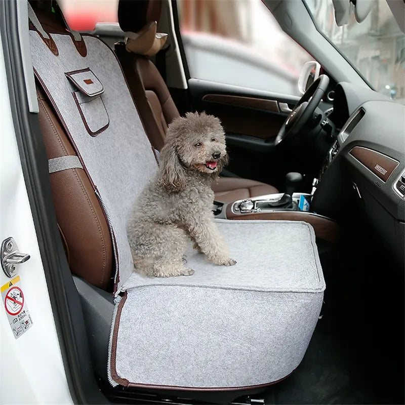 Durable pet car seat, grey, with built-in fastening strap for animal safety in vehicles.
