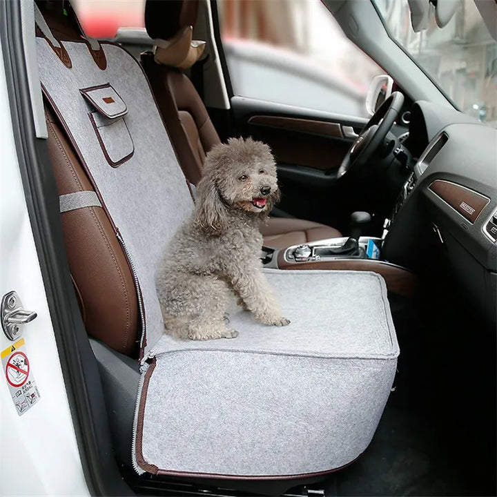 Durable pet car seat, grey, with built-in fastening strap for animal safety in vehicles.