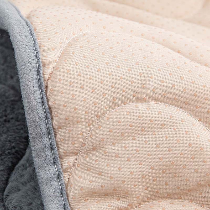 Plush sofa cover in grey, featuring a unique wave design and non-slip functionality