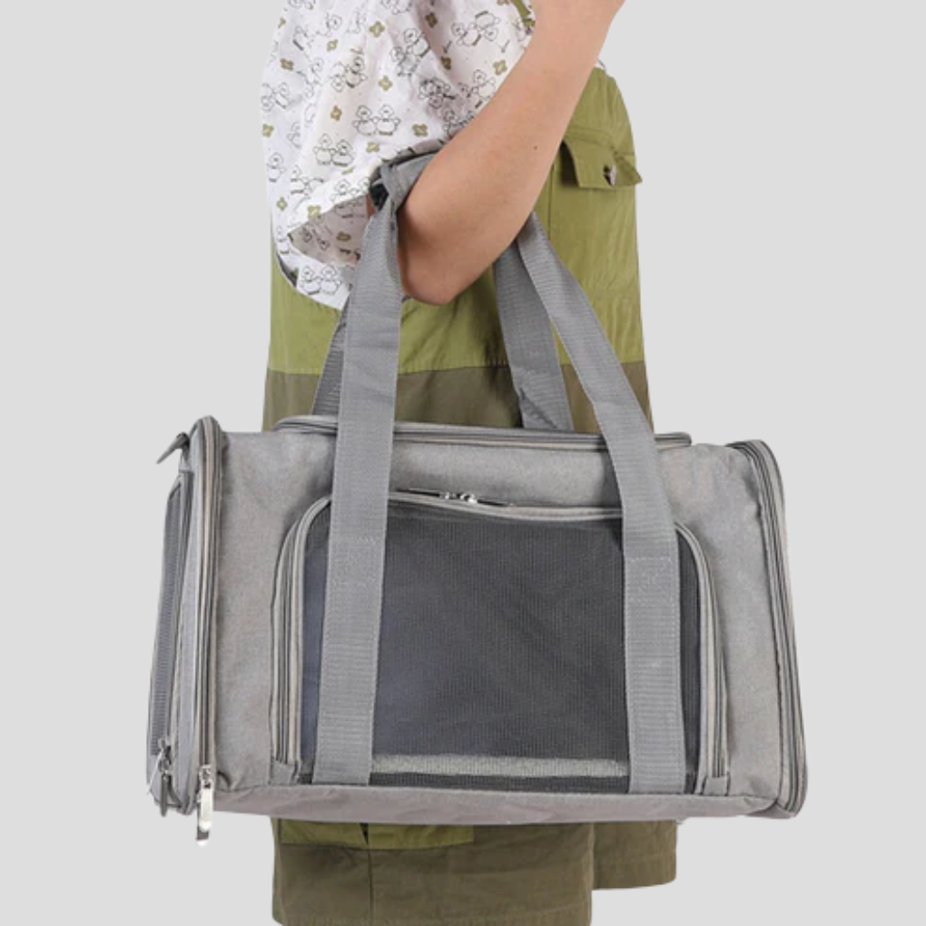 Grey portable soft-sided dog travel carrier for small breeds, airline approved