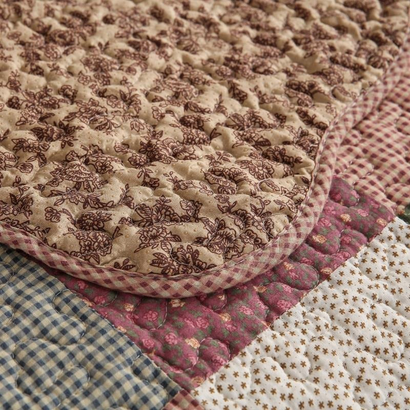Non-slip backing of a washable quilted cotton sofa cover, ensuring furniture stability and protection.