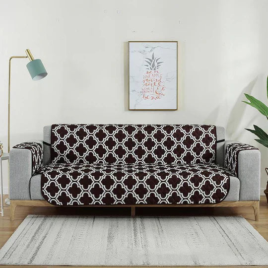 Brown sofa slipcover draped over couch, durable furniture protector for spills