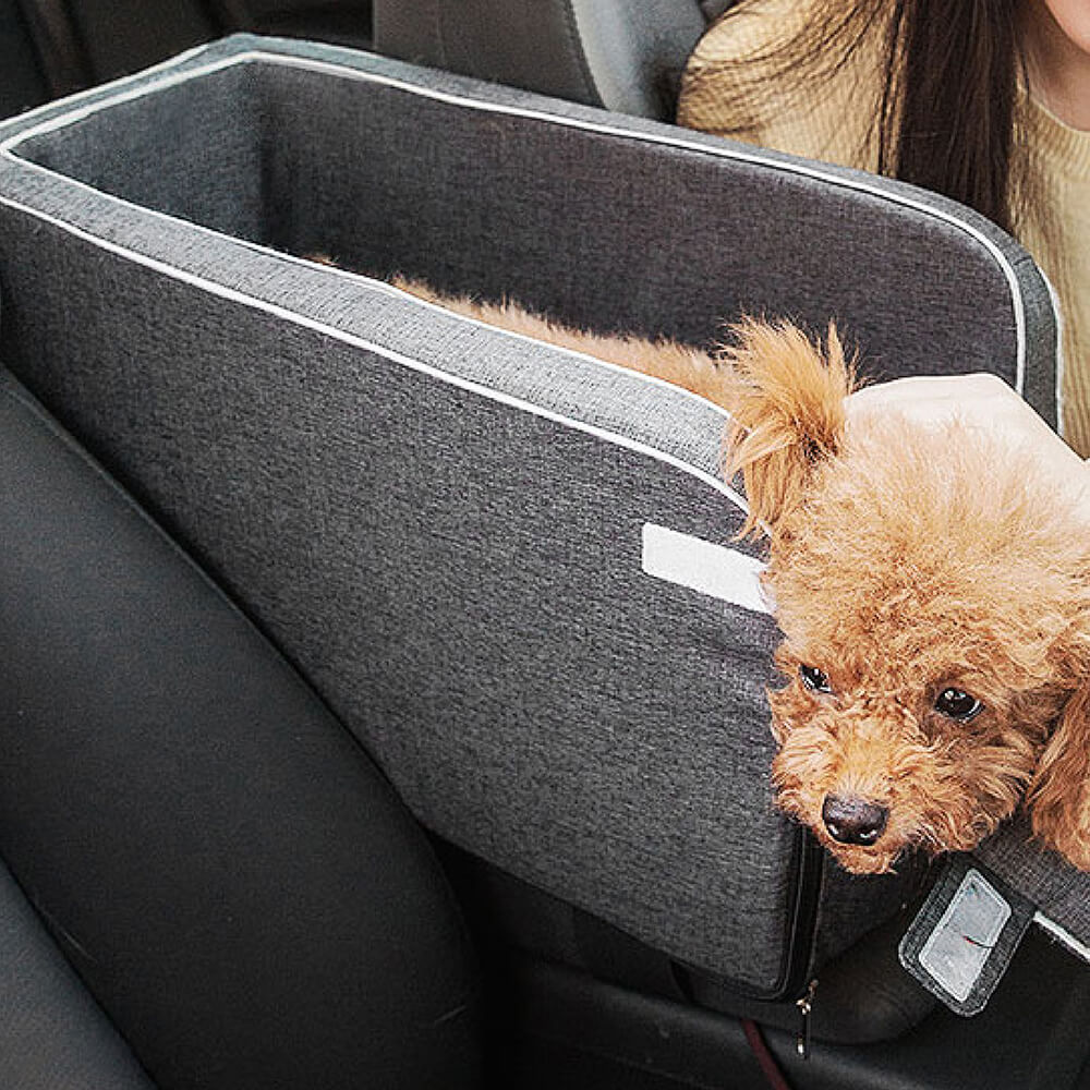 Machine washable suede dog car seat in a vehicle console, ready for pet comfort.