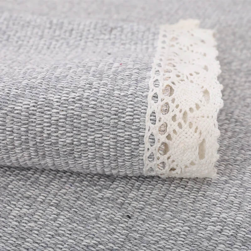 Soft cotton linen hand-woven couch cover in grey, a practical and aesthetic home textile